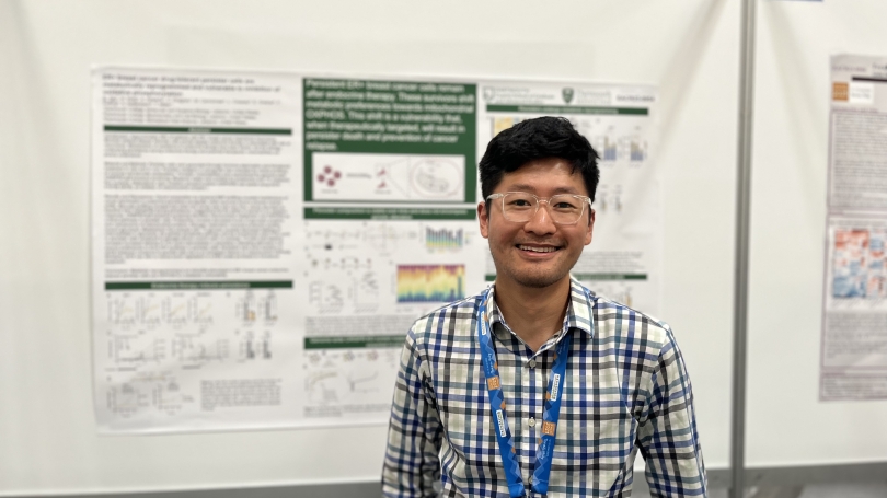Steven Tau Steven Tau in front of his research poster