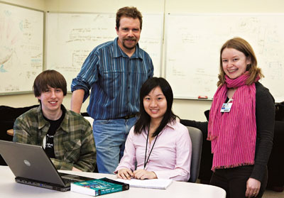 Computer Science Professor Sean Smith and students