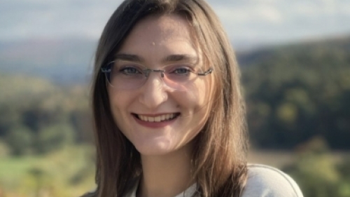 Close up portrait of a woman smiling.