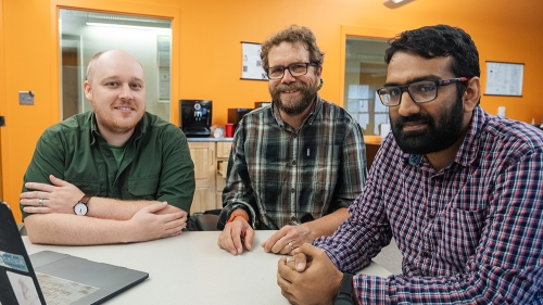 Dartmouth graduate students Ira Ray Jenkins, left, and Prashant Anantharaman, right, developed security hardware with support from Professor Sean Smith. 