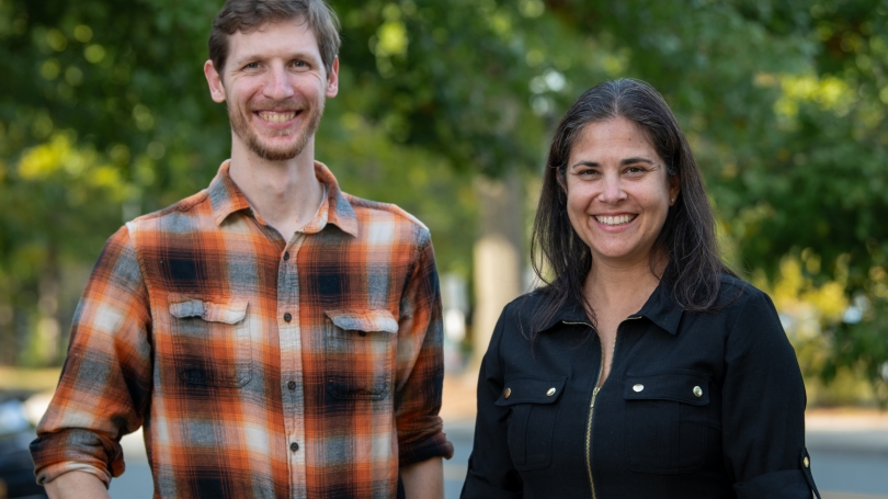 Postdoctoral researcher Mitchell Spring, left, and Kate Nautiyal, assistant professor of psychological and brain sciences, outside.