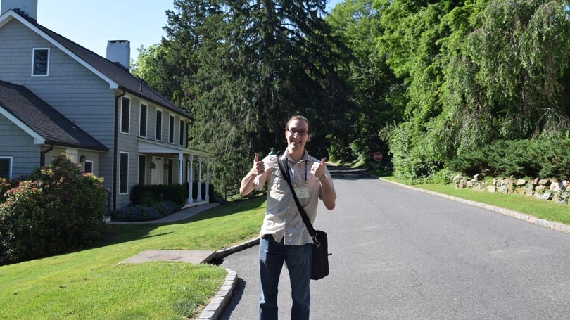Liviu Cengher Alumni Research Recipient at Dartmouth in front of Cold Springs Laboratory