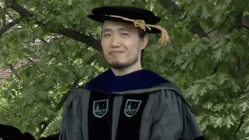A man in doctoral regalia